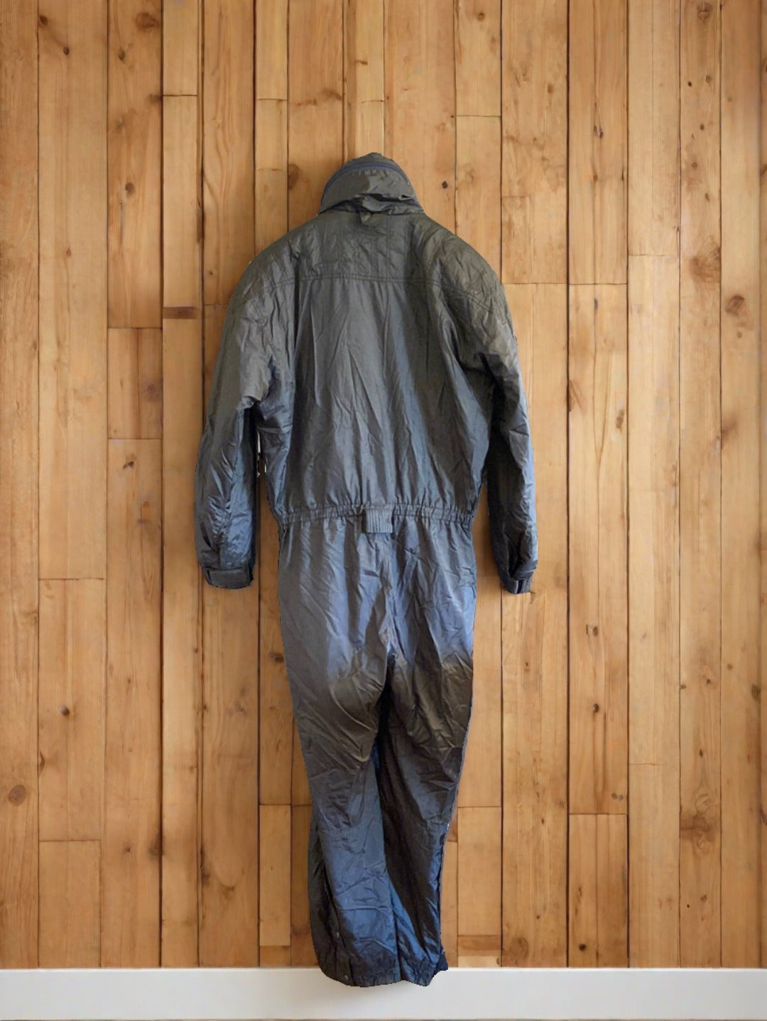 Rear view: Dark Olive Green Couloir 1-piece ski suit