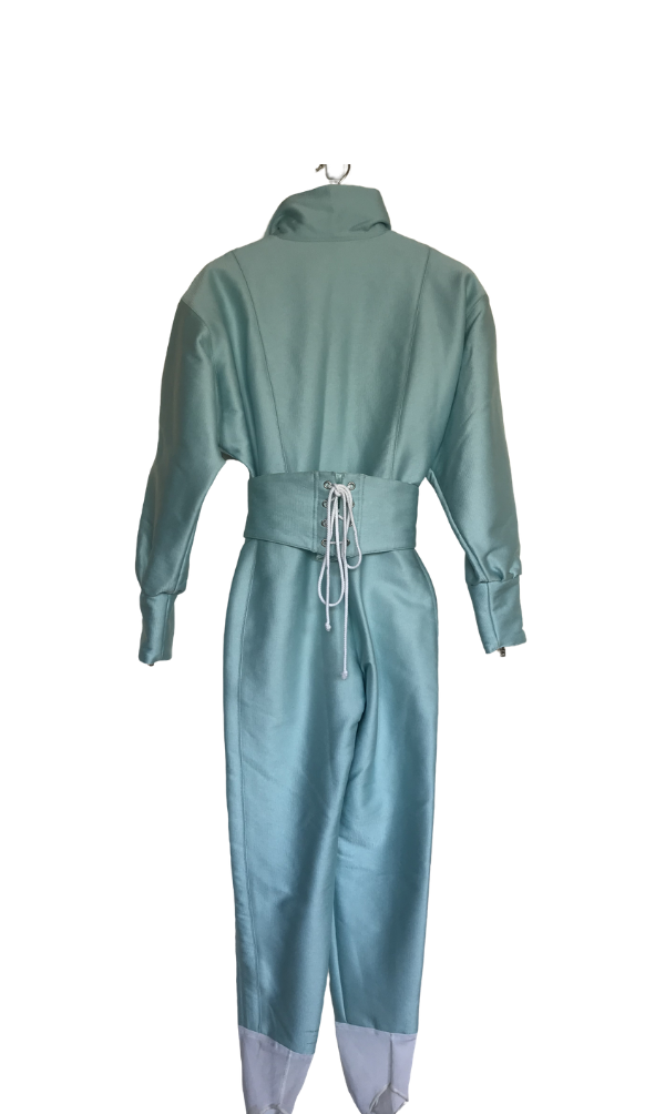 Vintage Bogner Iridescent Pale Baby Blue One Piece Ski Suit with Belt,.\. Back view on white background