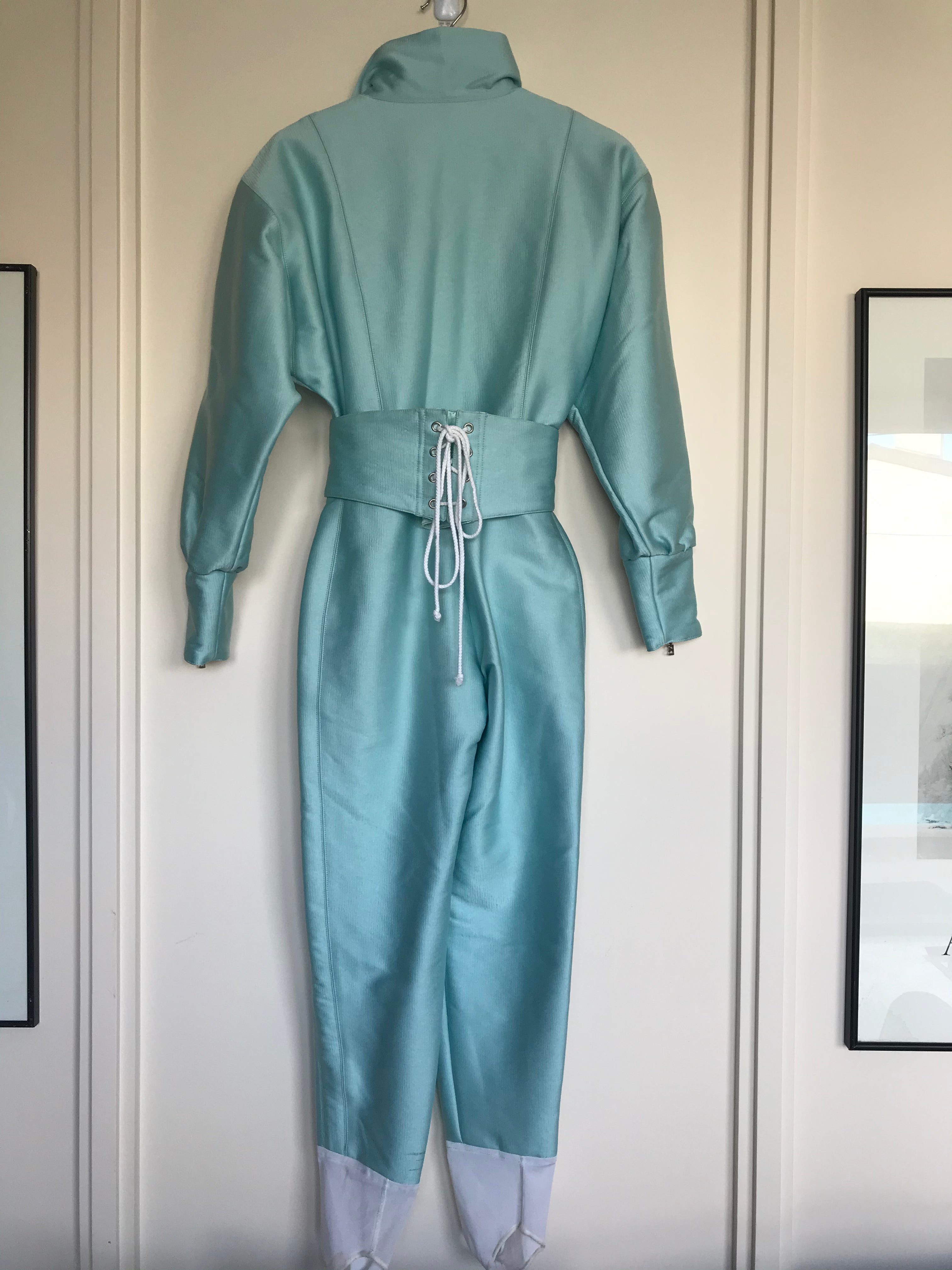 Vintage Bogner Iridescent Pale Baby Blue One Piece Ski Suit with Belt. Back