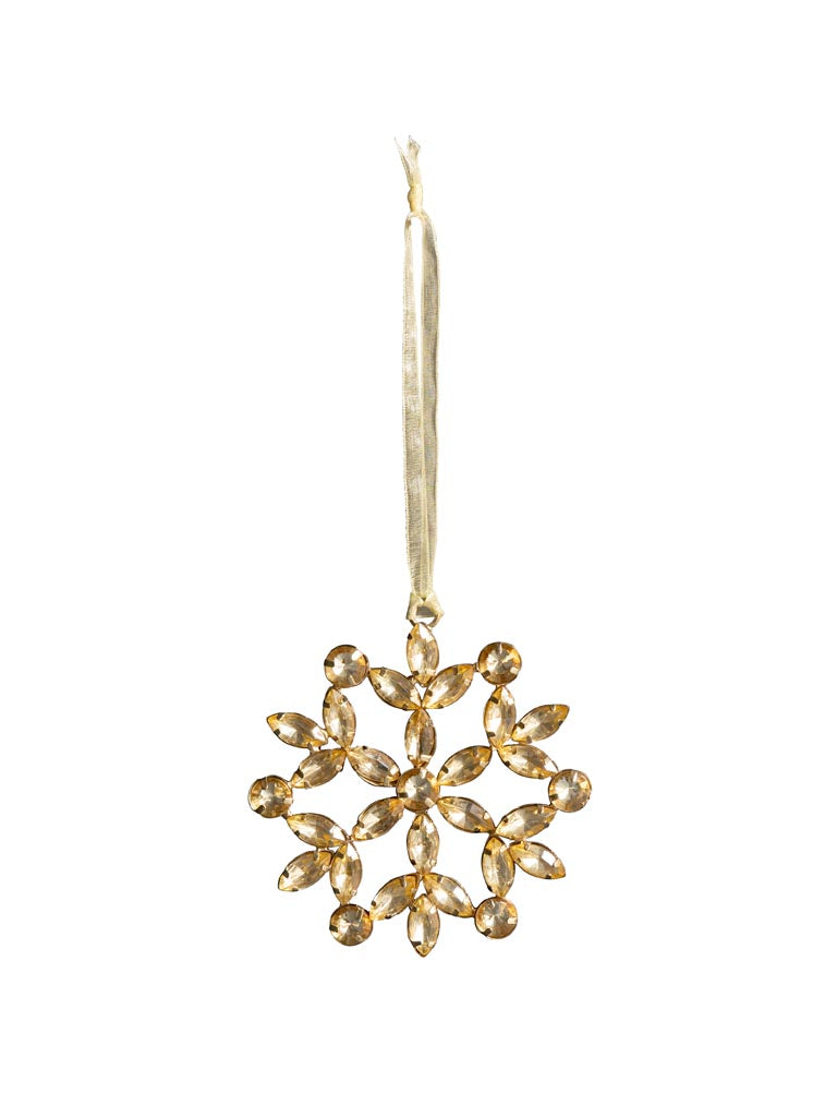 Golden Bead Snowflake, against white background