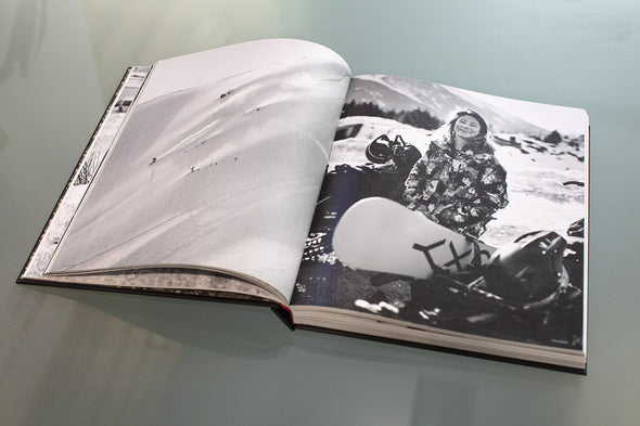 Heroes: women in snowboarding hardcover book. Book open showing photographs