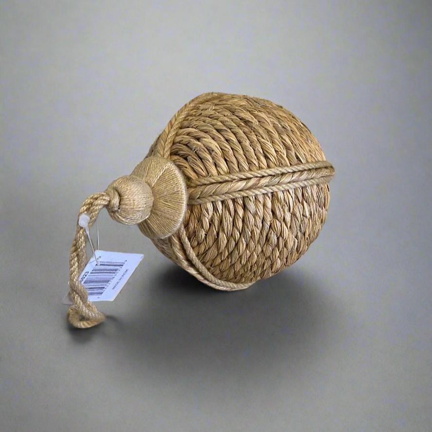 Round jute bouy shaped hanging ornament, showing hanging string from top down