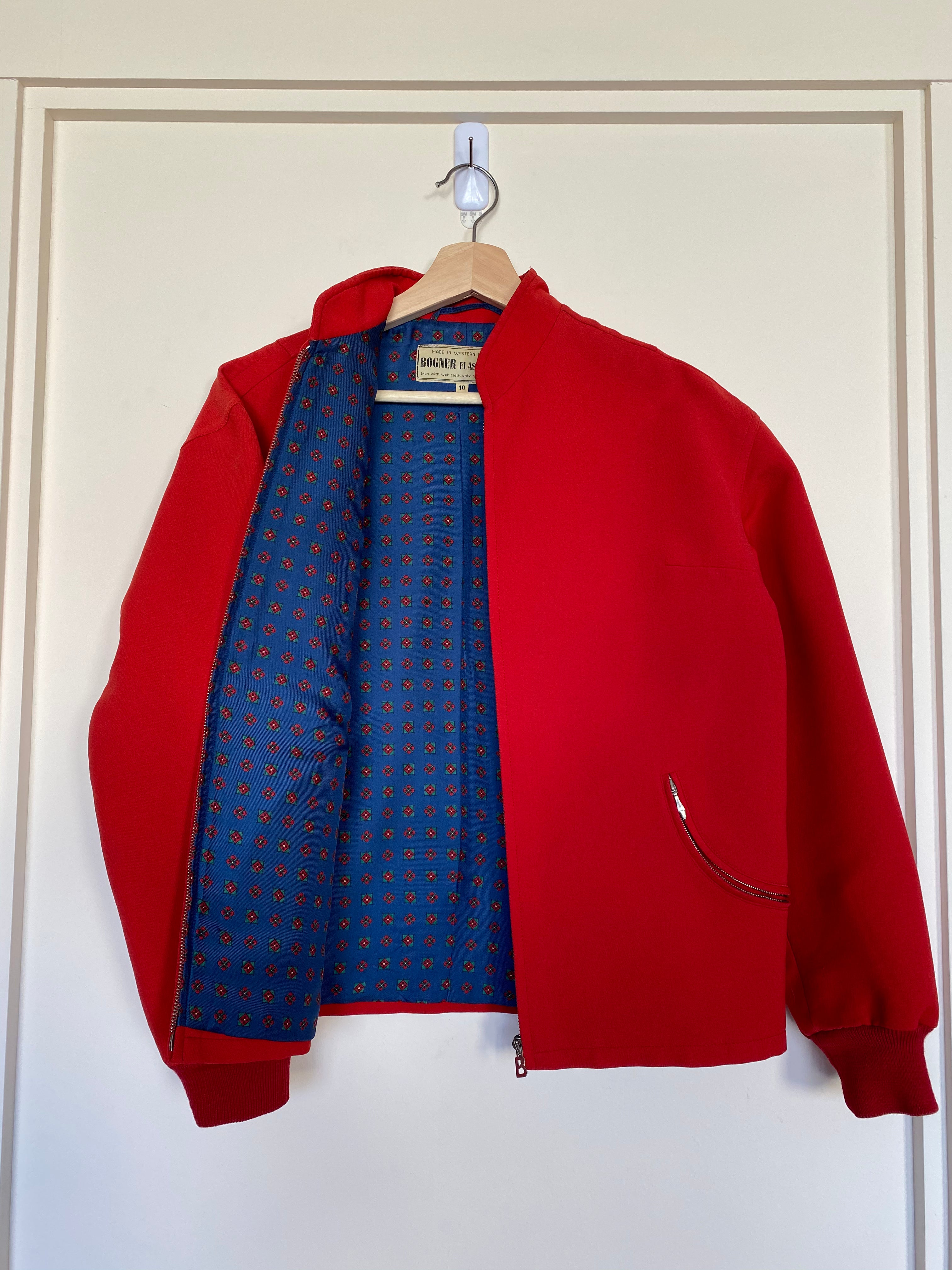 Vintage Bogner Red 2-piece ski suit, jacket open showing patterned lining