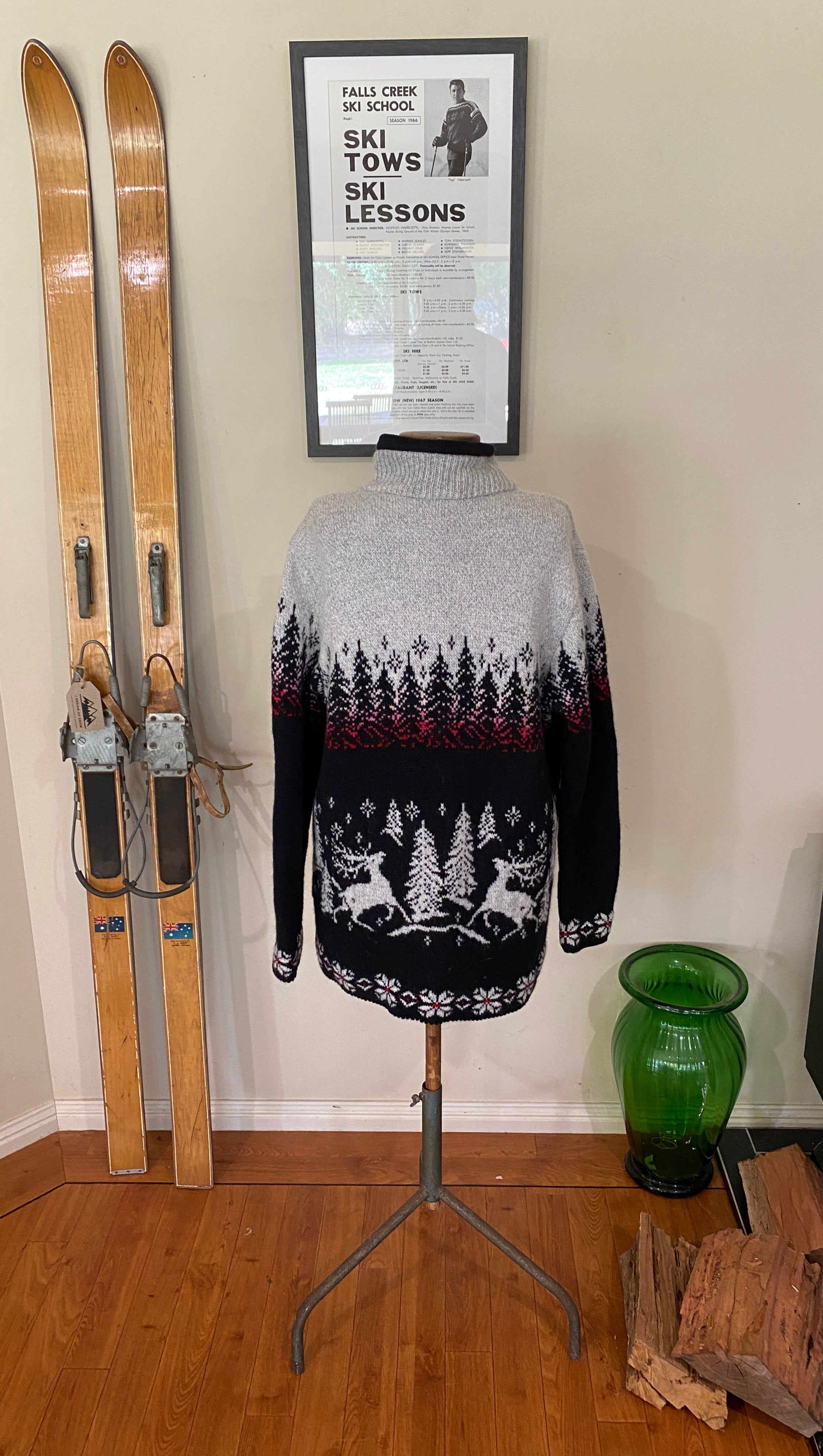 Vintage grey, black and red cardigan with full length zip and a reindeer in the forrest pattern with snowflakes. Back