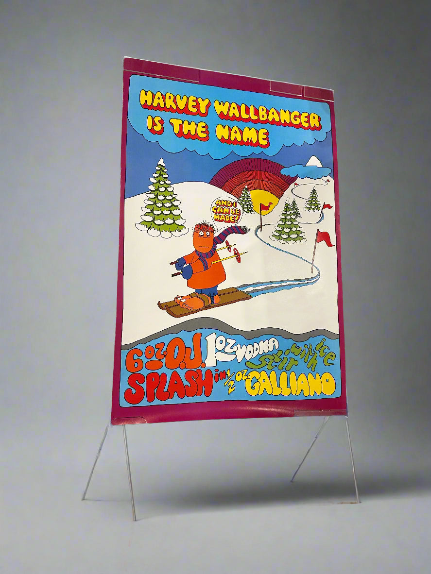 Vintage 1970's The Name Is Harvey Wallbanger Skiing Advertising Poster. Taken from an angle to reduce reflection/glare.