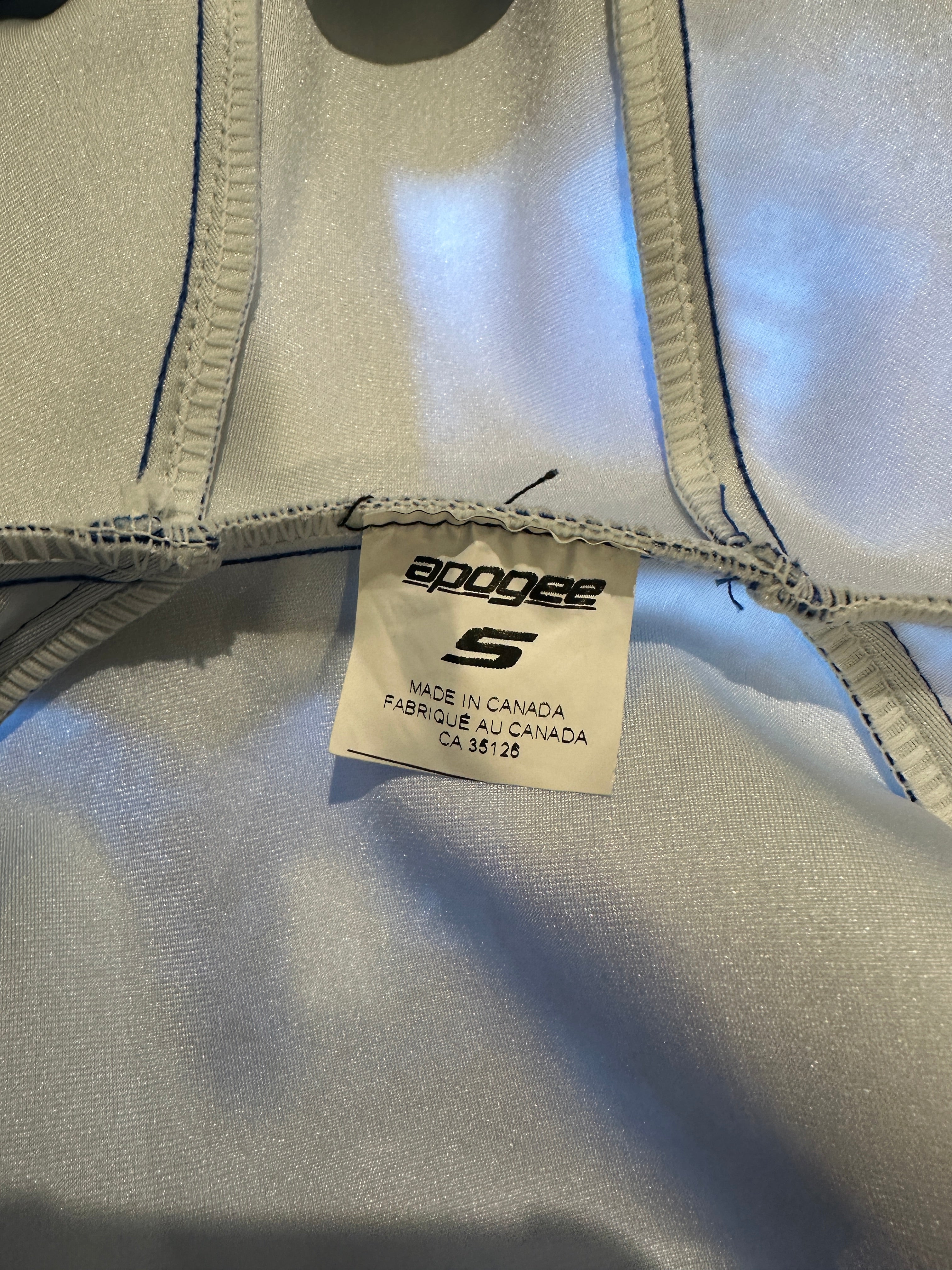 Early 2000's Fall Creek Race Club Padded Race Shell. Print on fabric featuring the words 'falls creek race club' and the 'swish' logo in navy and light blue. Size Label: S