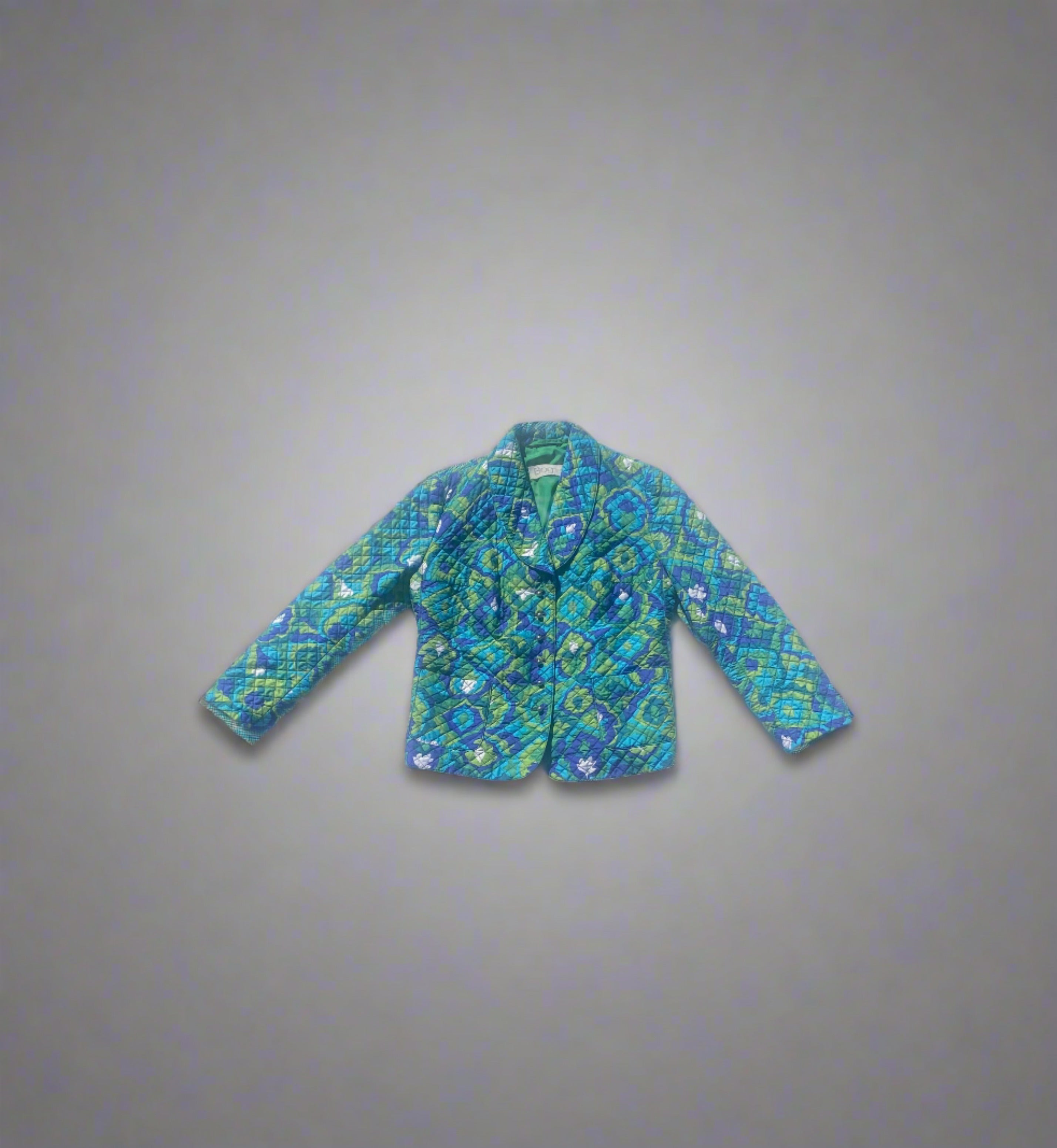 Vintage Bogner Vintage Bogner green, navy, teal blue quilted jacket with a floral pattern. Viewed from a distance