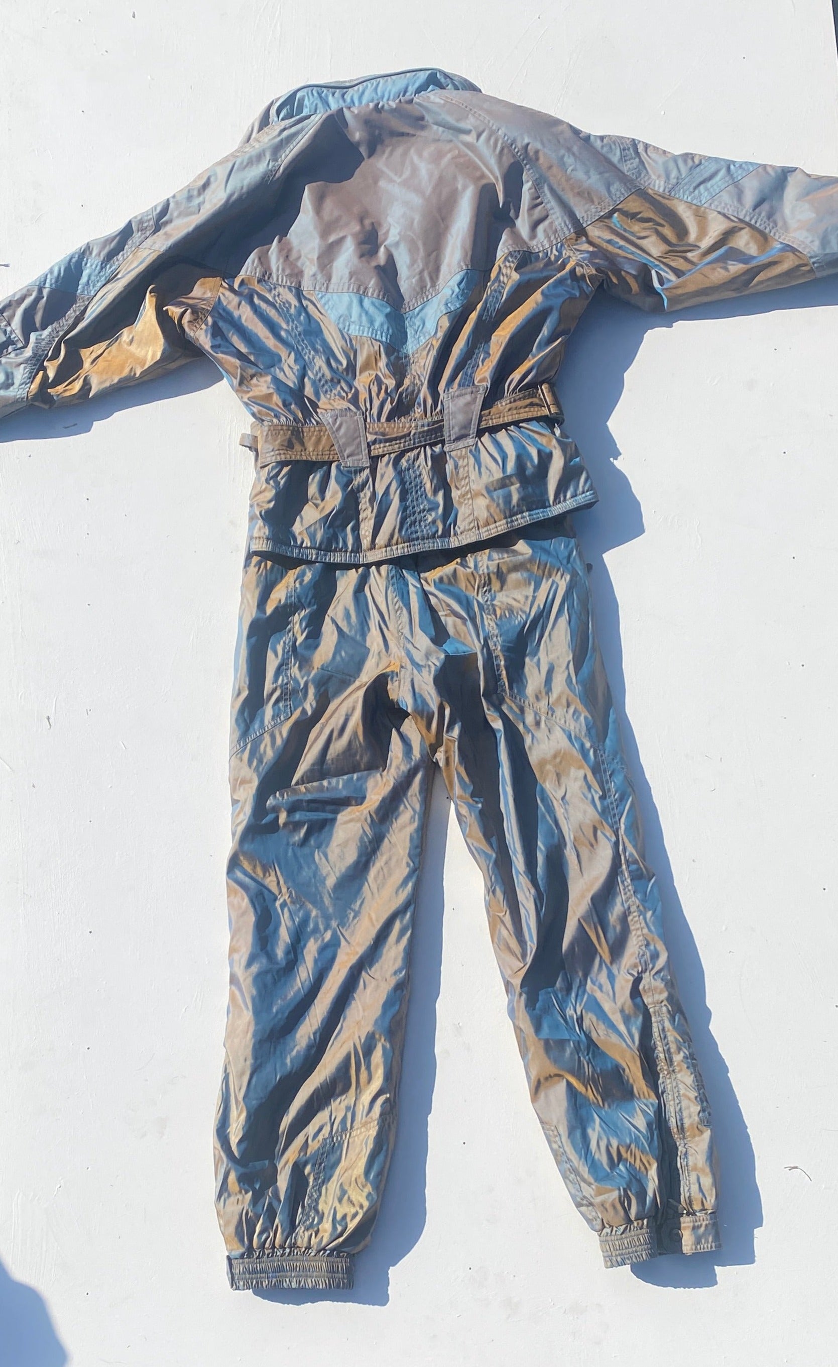 Vintage Nevica Iridescent Blue Beige Two-Piece Snow Suit. Rear of outfit view