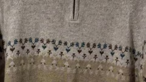 Close up of Vintage Woolrich Oatmeal Camel Coloured Jumper With Brown & Teal Love Heart and Deer Style Pattern.