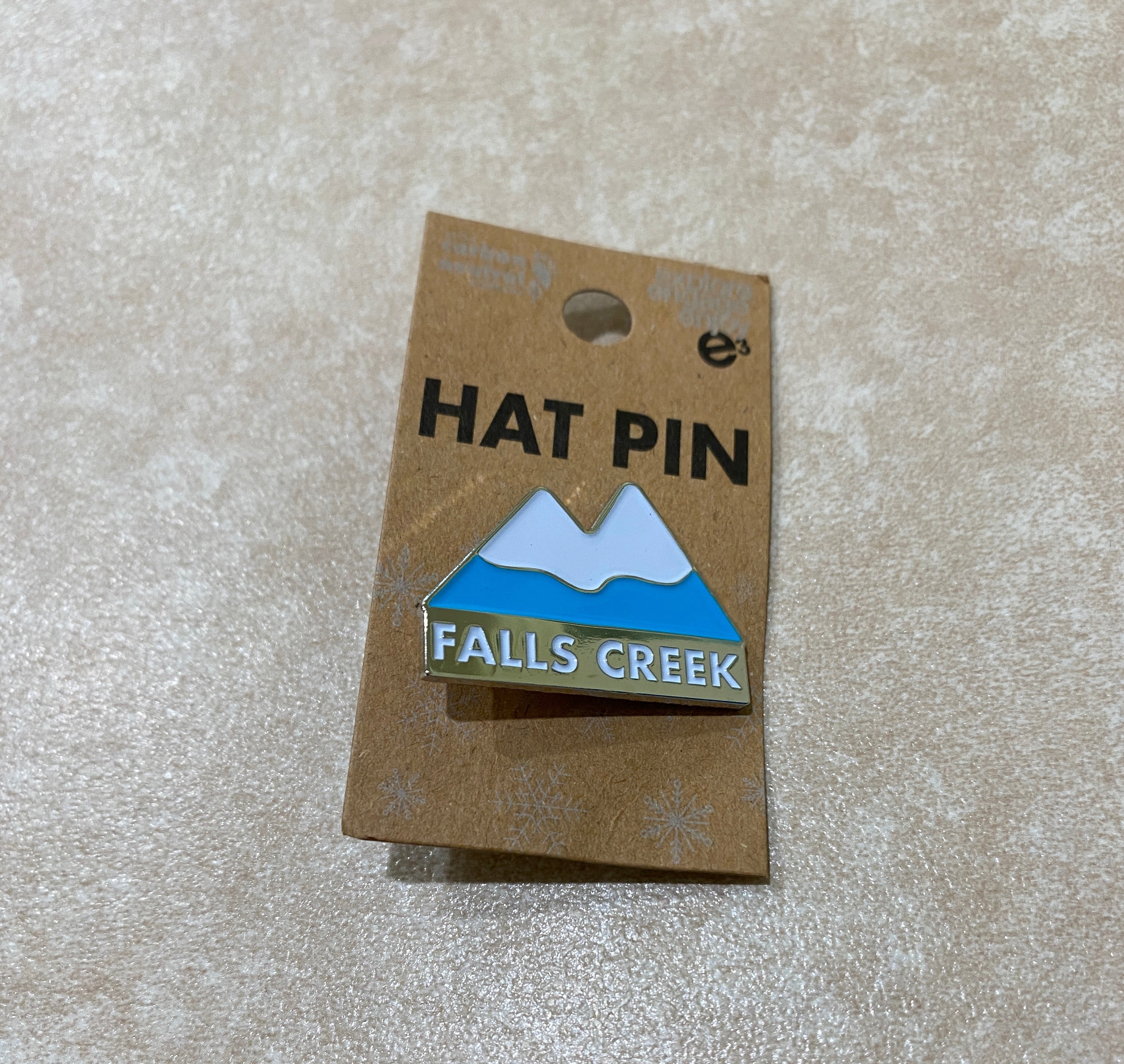 e3 Silver & White Falls Creek Mountain badge front