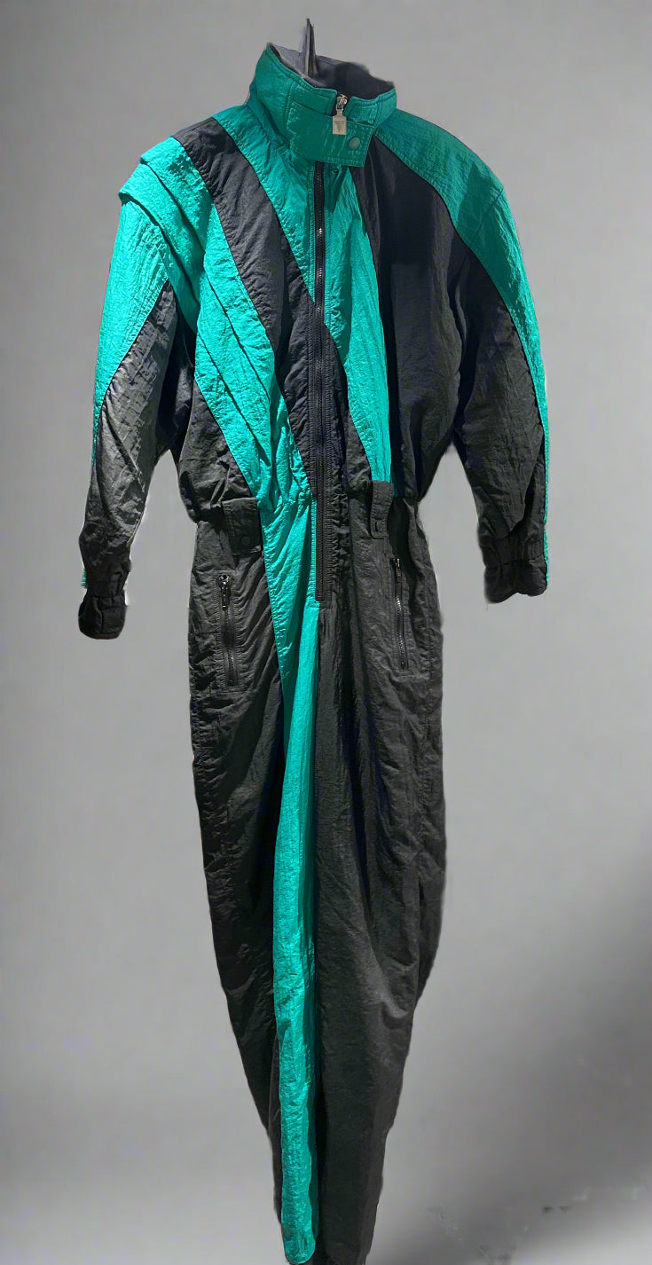 Tyrolia by Head Black & Green Asymmetrical Stripe 1-Piece Ski Suit. Front