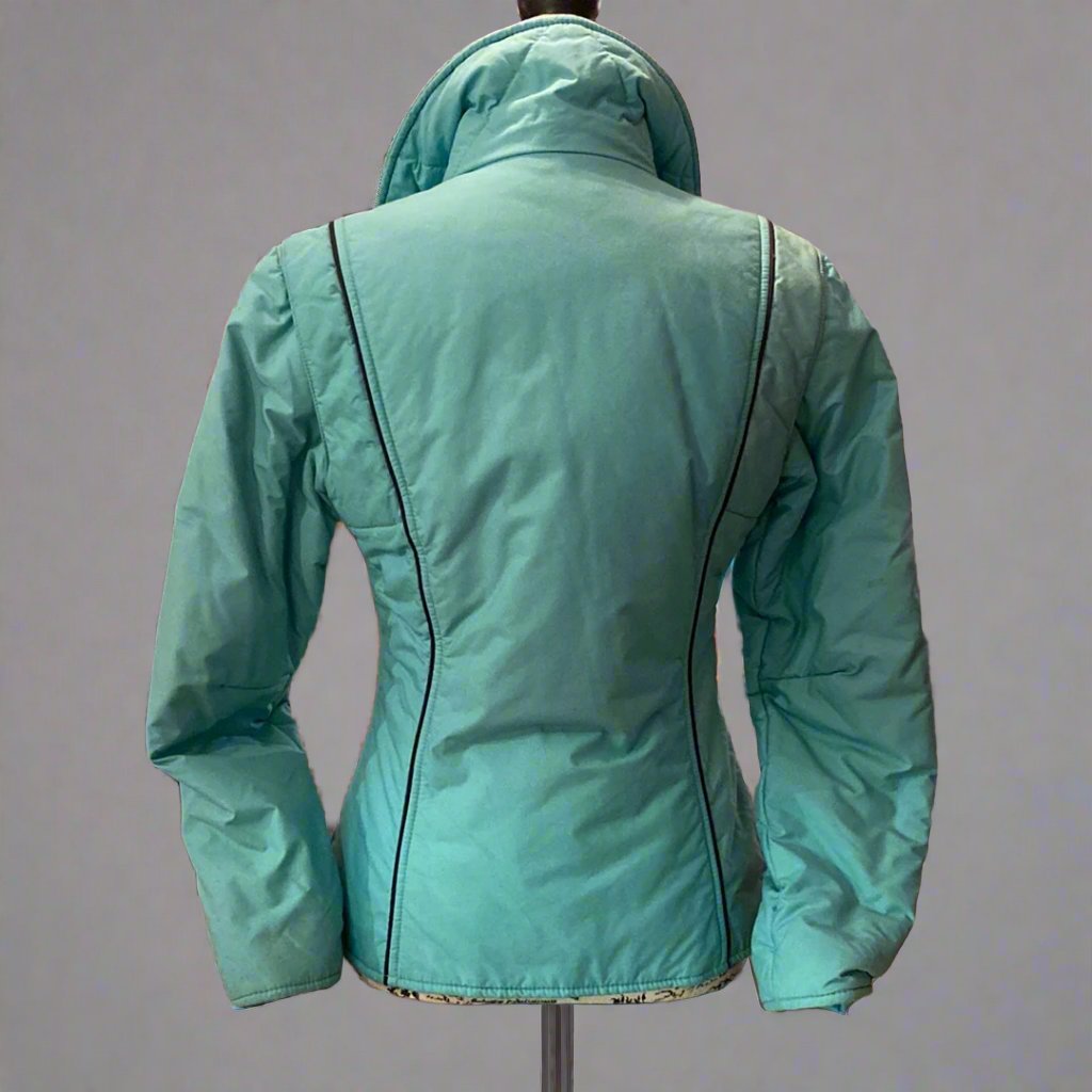 Vintage Head mint green jacket with pink, lime green and sky blue rainbow stripe detail on the chest of the jacket with two waist pockets and the iconic Head zipper pull. Rear