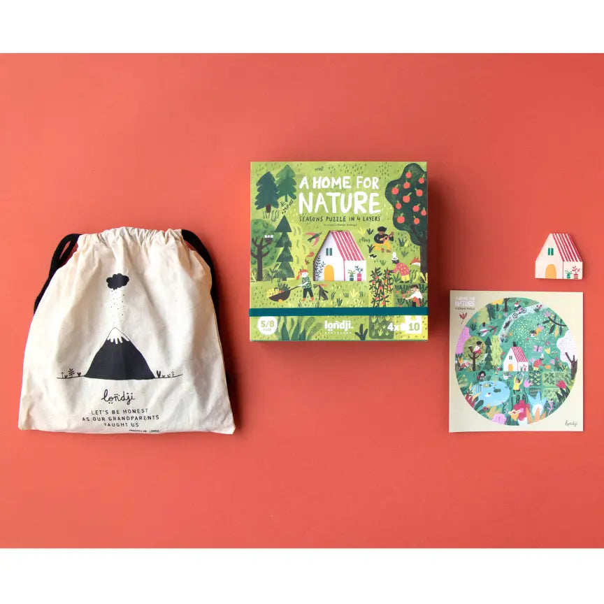 Image shows 'A home from nature' puzzle canvas bag, the puzzle box front and a piece of paper displaying an image of one of the completed puzzles. All shown on a red background with a white border