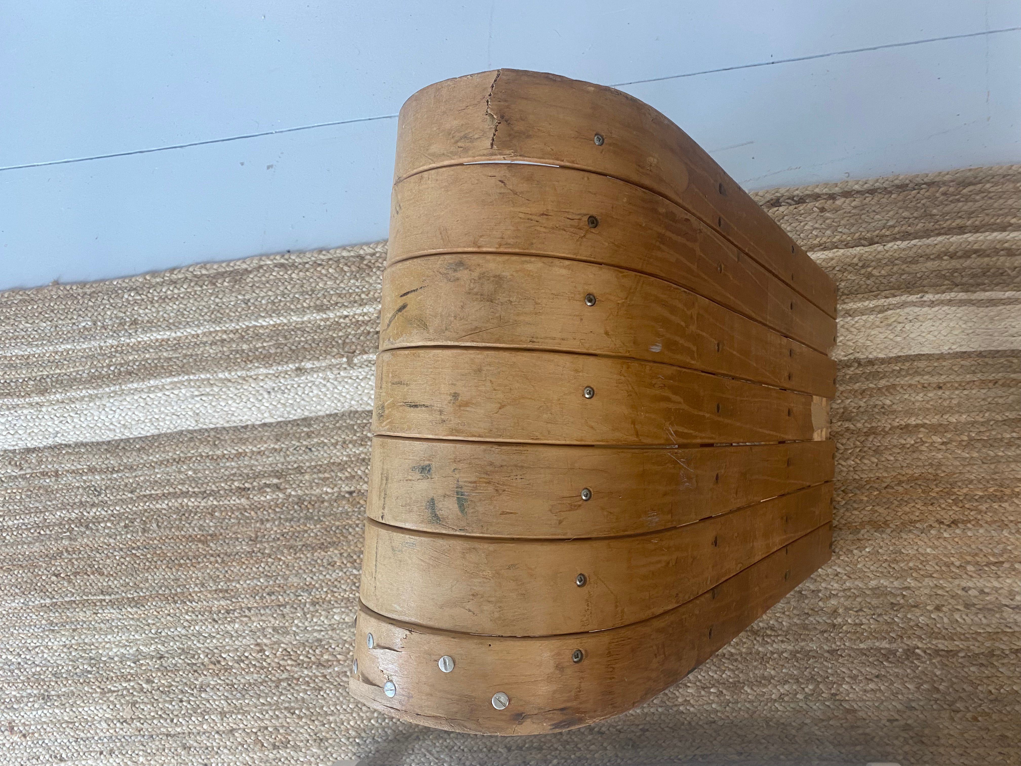 Vintage Torpedo steam bent wooden snow sled/toboggan with curved nose. view from the nose looking back along the length of the sled