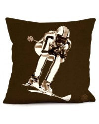 vintage ski racer graphic in white & beige on chocolate coloured cushion, on background of pure white