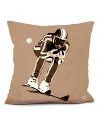 vintage ski racer graphic on beige coloured cushion, on background of pure white