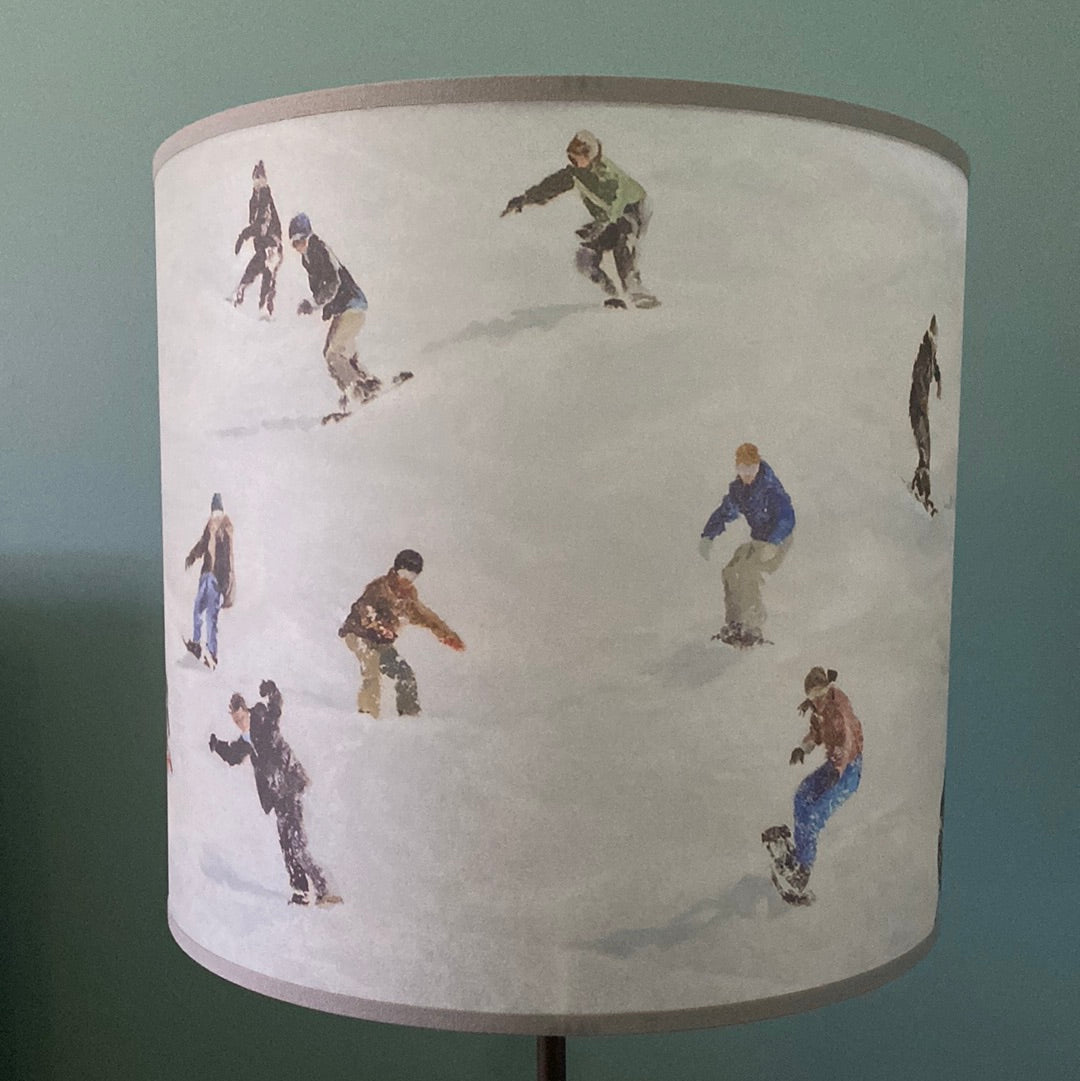 Close up of Snowboard lamp shade, in front of a green wall version 3
