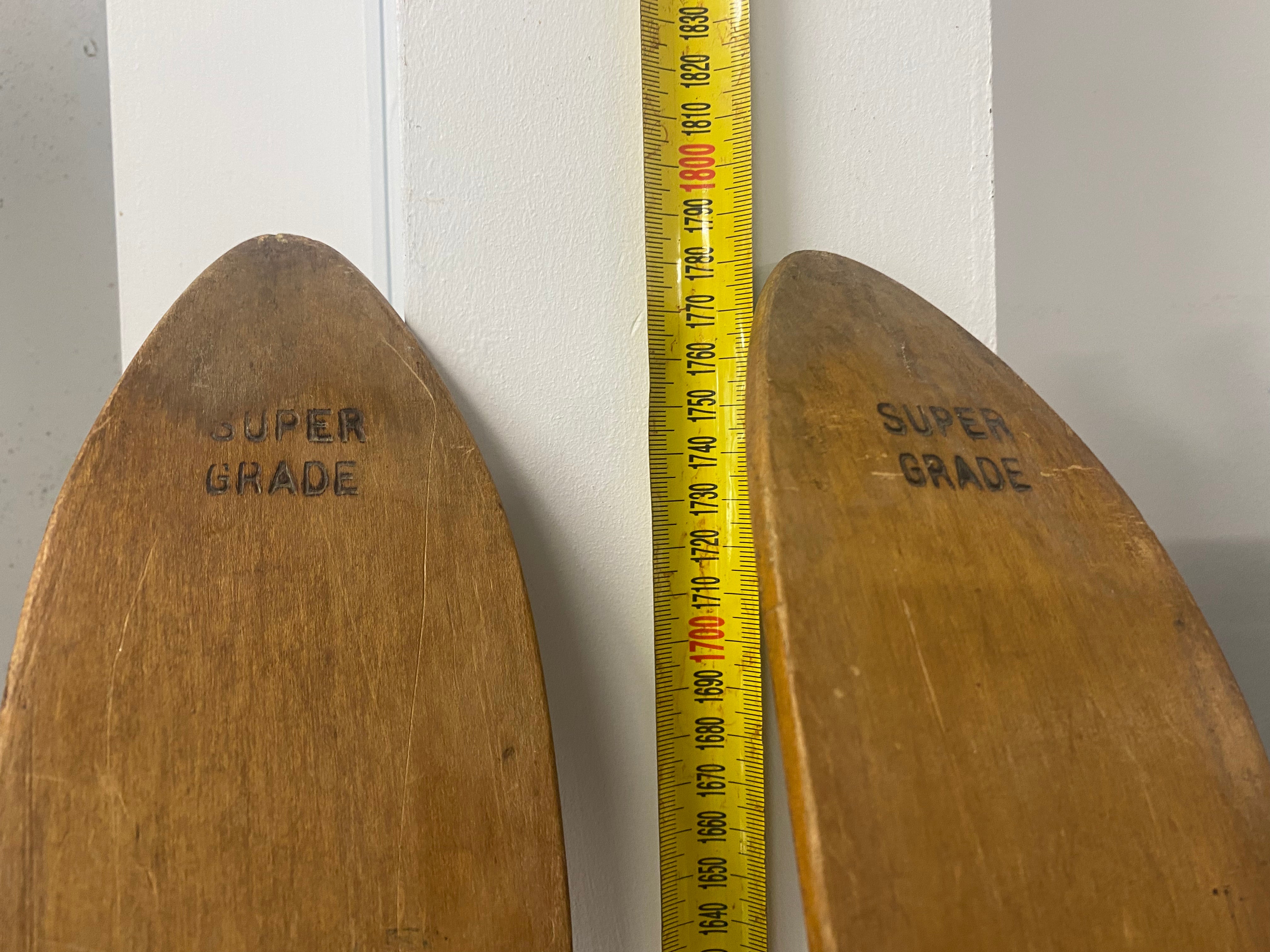 Peterborough Wooden Skis; ski tip bases with engravings stating "Super Grade"